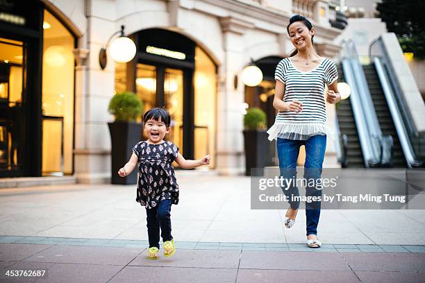Chasing Toddler Riley 202 Mom Chasing Toddler Stock Photos, High-Res Pictures, and Images ...