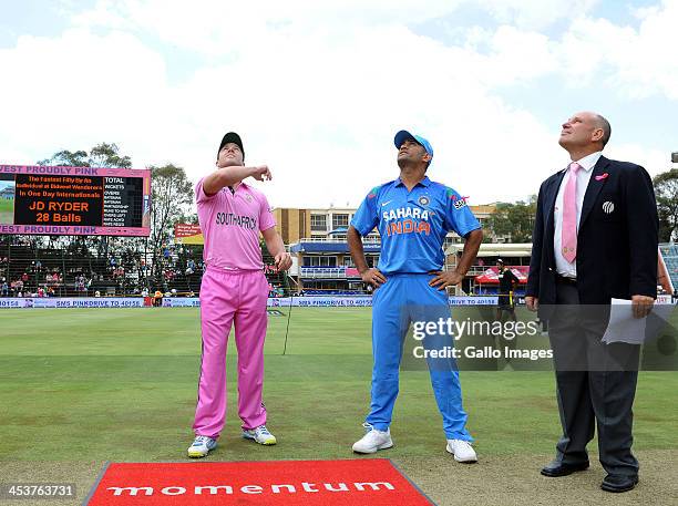 De Villiers and MS Dhoni at the toss before the 1st Momentum ODI match between South Africa and India at Bidvest Wanderers Stadium on December 05,...
