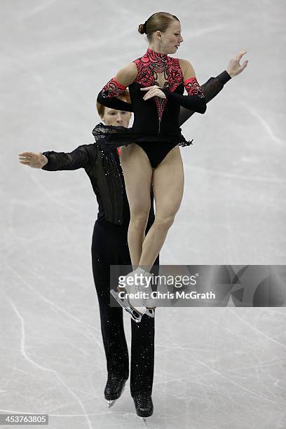 Evgenia Tarasova and Vladimir Morozov of Russia compete in the Junior Pairs Short Program during day one of the ISU Grand Prix of Figure Skating...
