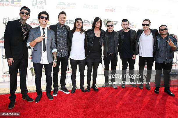 Drummer Mike Fuentes, bassist Jaime Preciado, vocalist Vic Fuentes and guitarist Tony Perry of Pierce the Veil and vocalist Kellin Quinn, bassist...