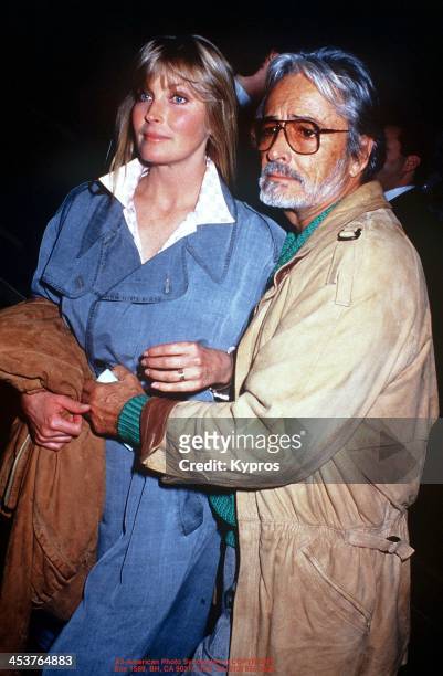 American actress Bo Derek with her husband, actor and director John Derek , circa 1983.
