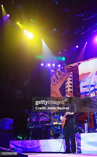 Musician Carlos Santana performs at Sprint Center on August 14, 2014 in Kansas City, Missouri.