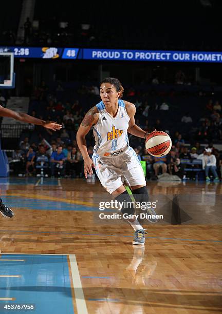 Courtney Clements of the Chicago Sky drives against the San Antonio Stars on August 17, 2014 at the Allstate Arena in Rosemont, Illinois. NOTE TO...