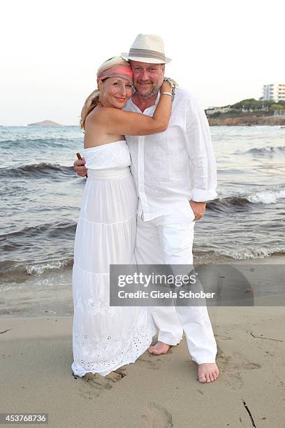 Birgitt Wolff and her boyfriend Harold Faltermeyer attend the wedding of star chef Holger Stromberg and his wife Nikita on August 9, 2014 in Ibiza,...