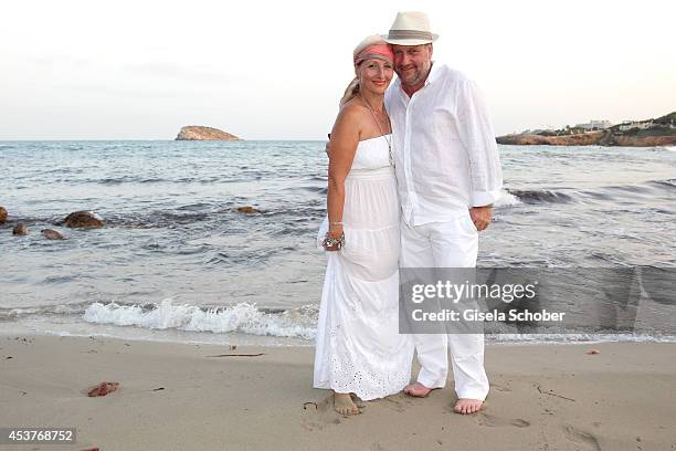 Birgitt Wolff and her boyfriend Harold Faltermeyer attend the wedding of star chef Holger Stromberg and his wife Nikita on August 9, 2014 in Ibiza,...