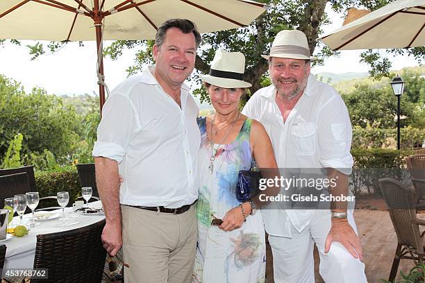 Joseph Schmid, Birgitt Wolff and her boyfriend Harold Faltermeyer attend the wedding of star chef Holger Stromberg and his wife Nikita on August 9,...