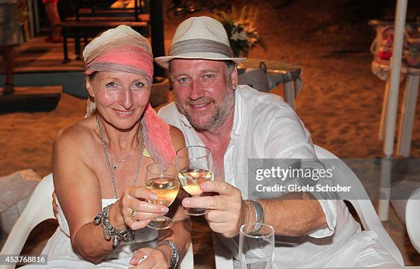 Birgitt Wolff and her boyfriend Harold Faltermeyer attend the wedding of star chef Holger Stromberg and his wife Nikita on August 9, 2014 in Ibiza,...