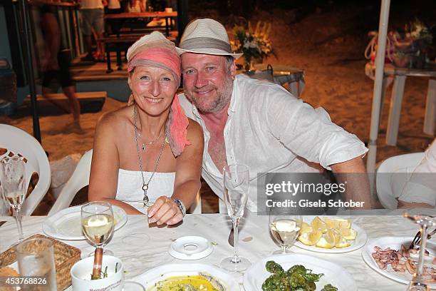 Birgitt Wolff and her boyfriend Harold Faltermeyer attend the wedding of star chef Holger Stromberg and his wife Nikita on August 9, 2014 in Ibiza,...