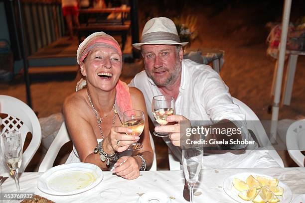 Birgitt Wolff and her boyfriend Harold Faltermeyer attend the wedding of star chef Holger Stromberg and his wife Nikita on August 9, 2014 in Ibiza,...