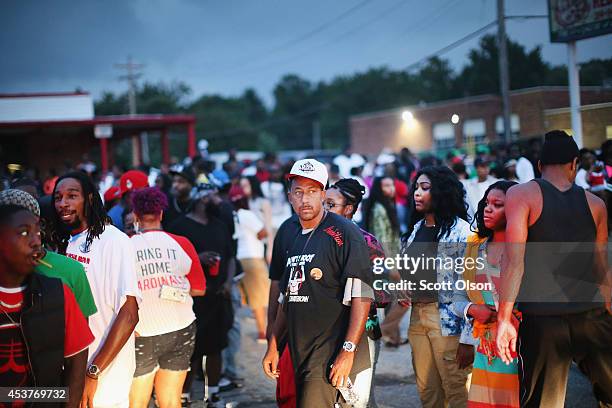 Demonstrators protest the killing of teenager Michael Brown on August 17, 2014 in Ferguson, Missouri. Despite the Brown family's continued call for...