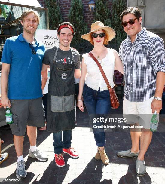 Actors Aaron Staton, Ben Feldman, Christina Hendricks, and Rich Sommer attend Crab Cake 2014 presented by S. Pellegrino & Samsung Galaxy on August...