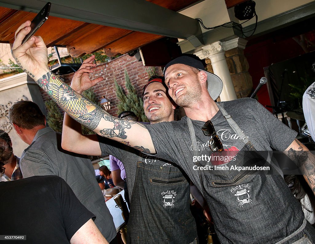 Actor Ben Feldman and chef Michael Voltaggio take a selfie during