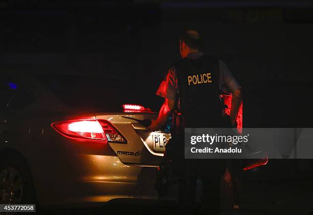 Protests in the Missouri city of Ferguson over the death of an 18-year-old black man, erupted following the release of the name of the police officer...