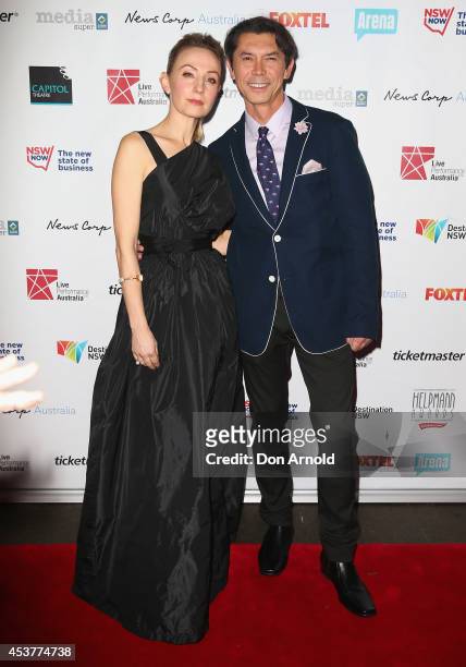 Lisa McCune and Lou Diamond Phillips arrive at the 2014 Helpmann Awards at the Capitol Theatre on August 18, 2014 in Sydney, Australia.