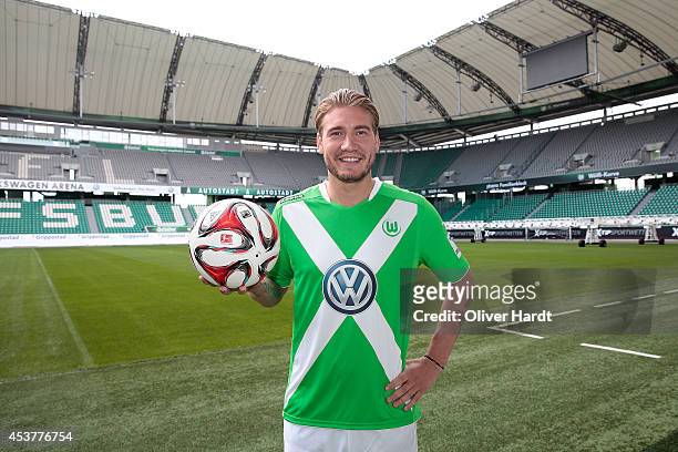 New Player Nicklas Bendtner of VfL Wolfsburg poses during a portrait session at Volkswagen Arena on August 15, 2014 in Wolfsburg, Germany.