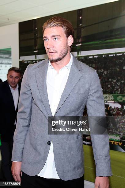 New Player Nicklas Bendtner of VfL Wolfsburg attends a press conference at Volkswagen Arena on August 15, 2014 in Wolfsburg, Germany.