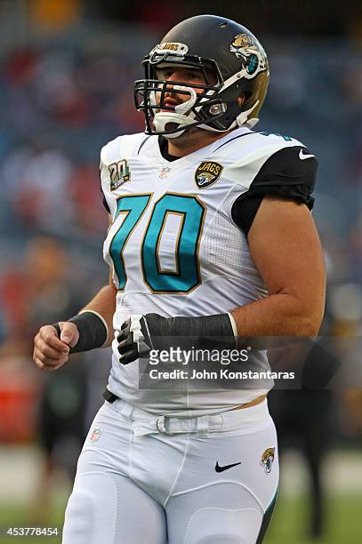 Luke Bowanko of the Jacksonville Jaguars warms up prior to a preseason game against the Chicago Bears at Soldier Field on August 14, 2014 in Chicago,...