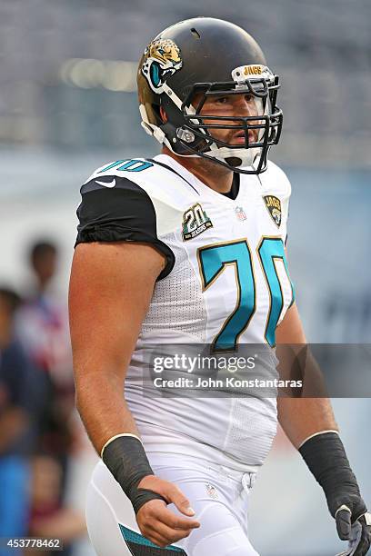 Luke Bowanko of the Jacksonville Jaguars warms up prior to a preseason game against the Chicago Bears at Soldier Field on August 14, 2014 in Chicago,...