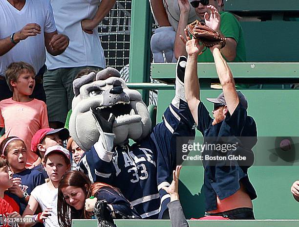 The big blast was a grand slam by Houston's Jose Altuve that ended up on the Green Monster, where a fan battled the Yale University mascot for the...