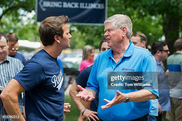 Rep. Aaron Schock, R-Ill., left, talks with Jim Oberwies, Republican senate candidate for Illinois, during Republican Day at the Illinois State Fair...