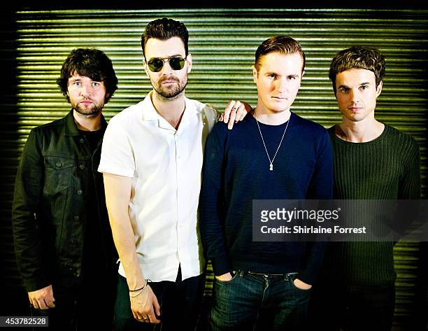 Michael Campbell, Liam Fray, Daniel 'Conan' Moores and Mark Cuppello of The Courteeners pose backstage after signing copies of their new album...