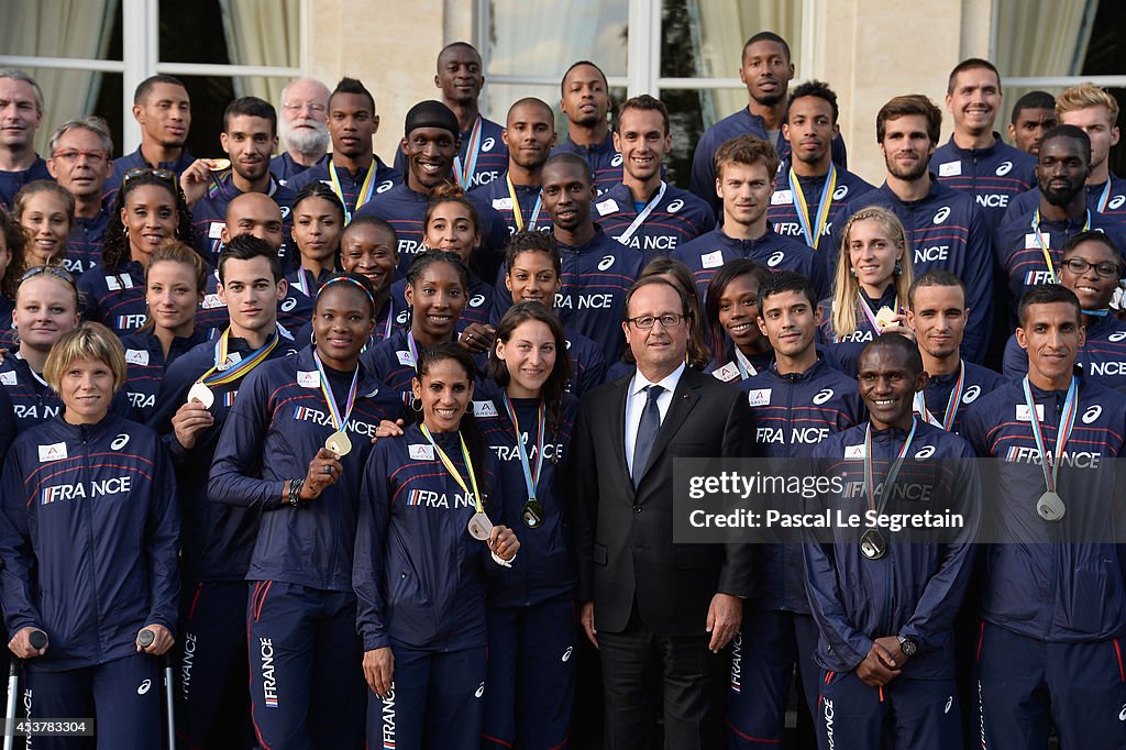 President Francois Hollande Hosts France Athletics Team At Elysee Palace