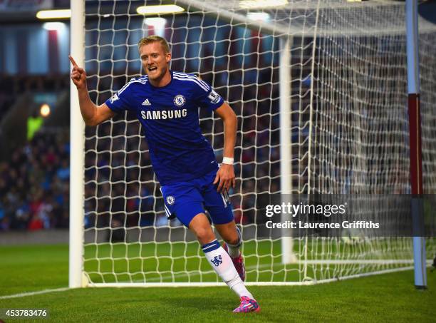 Andre Schurrle of Chelsea celebrates scoring their second goal during the Barclays Premier League match between Burnley and Chelsea at Turf Moor on...