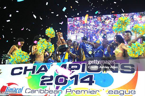 Dwayne Smith of the Barbados Tridents celebrate after the Limacol Caribbean Premier League 2014 final match between Guyana Amazon Warriors and...