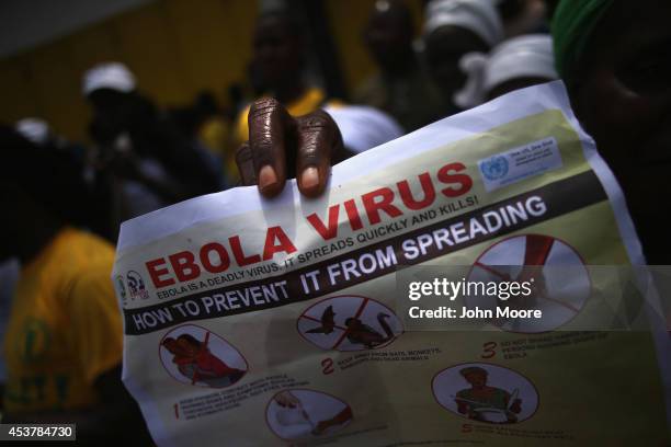 Public health advocates stage an Ebola awareness and prevention event on August 18, 2014 in Monrovia, Liberia. The Liberian government and...