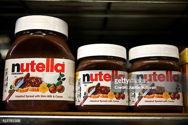 Jars of Nutella are displayed on a shelf at a market on August 18, 2014 in San Francisco, California. The threat of a Nutella shortage is looming...