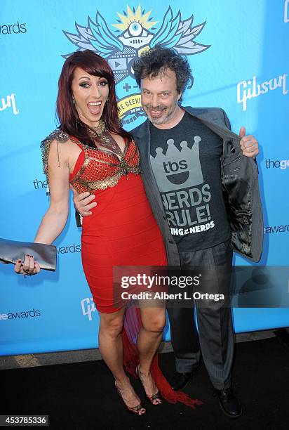 Founder Kristen Nedopak and actor Curtis Armstrong arrive for The Geekie Awards 2014 held at Avalon on August 17, 2014 in Hollywood, California.