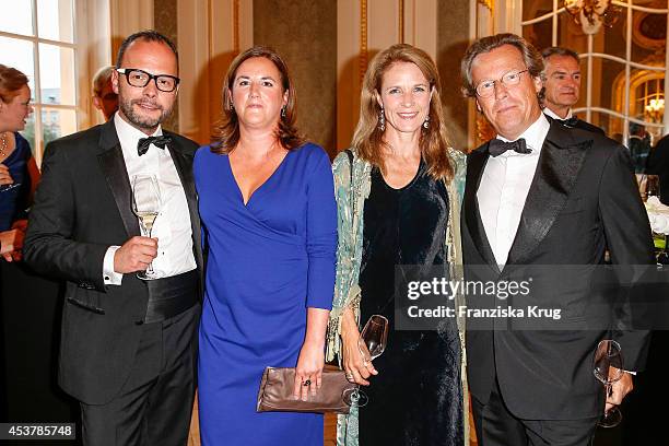 Alexander Franke, Kathrin Franke, Sybille Wasmuth and Dirk von Haeften attend the Dom Perignon Stage Dinner on August 18, 2014 in Hamburg, Germany.