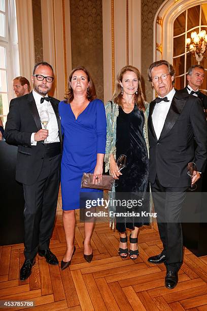 Alexander Franke, Kathrin Franke, Sybille Wasmuth and Dirk von Haeften attend the Dom Perignon Stage Dinner on August 18, 2014 in Hamburg, Germany.