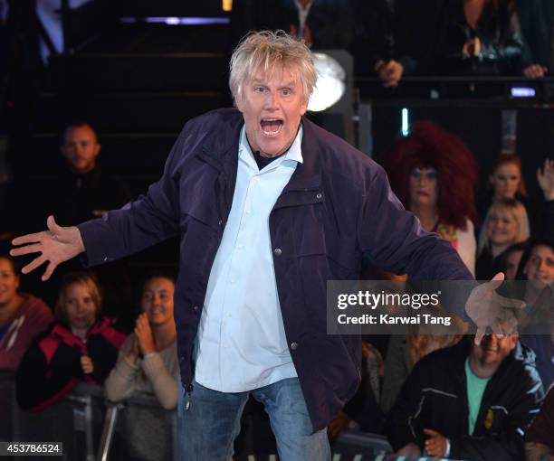 Gary Busey enters the Celebrity Big Brother house at Elstree Studios on August 18, 2014 in Borehamwood, England.