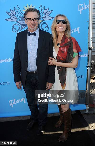 Actor Robert Carradine and Edie Mani arrive for The Geekie Awards 2014 held at Avalon on August 17, 2014 in Hollywood, California.