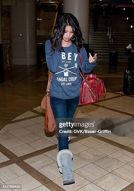 Selena Gomez is seen at Los Angeles International Airport on March 02, 2012 in Los Angeles, California.