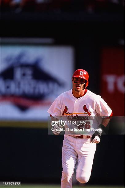 Eli Marrero of the St. Louis Cardinals runs against the Anaheim Angels on June 20, 2002 at Busch Stadium in St. Louis, Missouri.