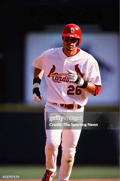 Eli Marrero of the St. Louis Cardinals runs against the Anaheim Angels on June 20, 2002 at Busch Stadium in St. Louis, Missouri.