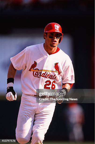 Eli Marrero of the St. Louis Cardinals runs against the Anaheim Angels on June 20, 2002 at Busch Stadium in St. Louis, Missouri.