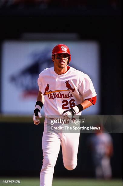 Eli Marrero of the St. Louis Cardinals runs against the Anaheim Angels on June 20, 2002 at Busch Stadium in St. Louis, Missouri.