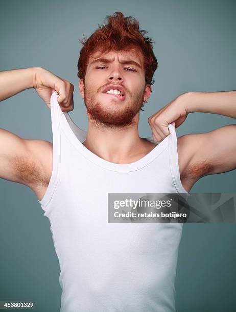 redhead boy - biting lip ストックフォトと画像