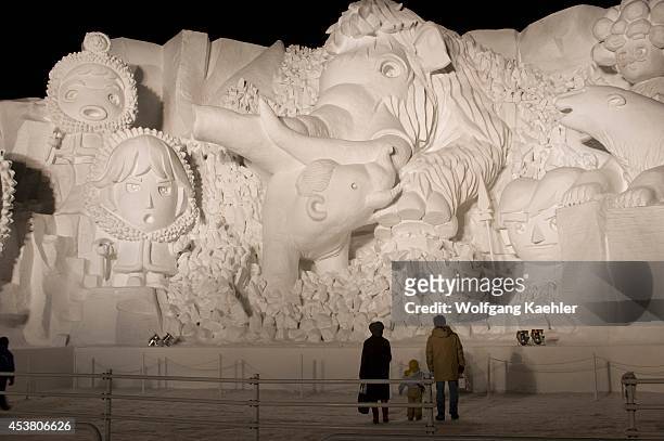Japan, Hokkaido Island, Sapporo, Sapporo Snow Festival, Snow Sculpture Illuminated At Night.