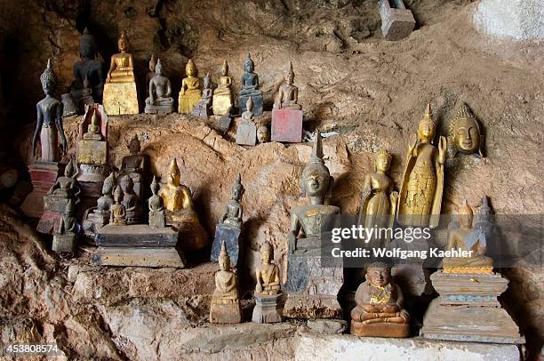 Laos, Near Luang Prabang, Mekong River, Pak Ou Caves, Buddha Statues.