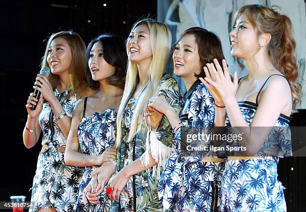 Pose for photographs during their autograph session at Sinchon CGV on August 16, 2014 in Seoul, South Korea.