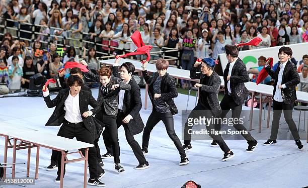 Super Junior perform onstage during the SMTOWN Live World Tour IV in Seoul at Seoul World Cup stadium on August 15, 2014 in Seoul, South Korea.