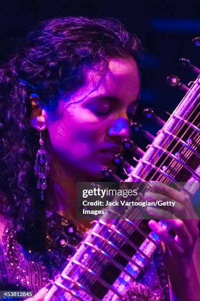 British-born Indian musician Anoushka Shankar plays sitar as she leads her ensemble during a performance at Joe's Pub, New York, New York, October...