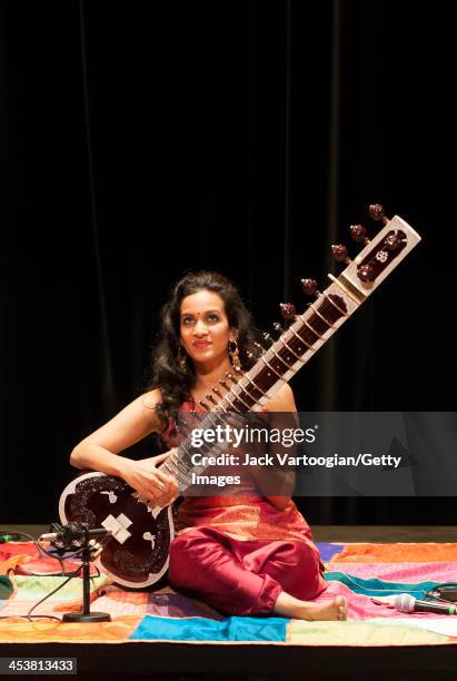 British-born Indian musician Anoushka Shankar plays sitar as she leads her ensemble during a World Music Institute concert at New York University's...