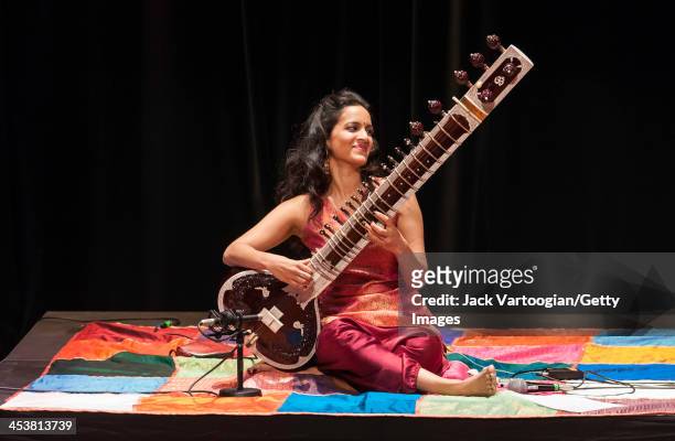 British-born Indian musician Anoushka Shankar plays sitar as she leads her ensemble during a World Music Institute concert at New York University's...