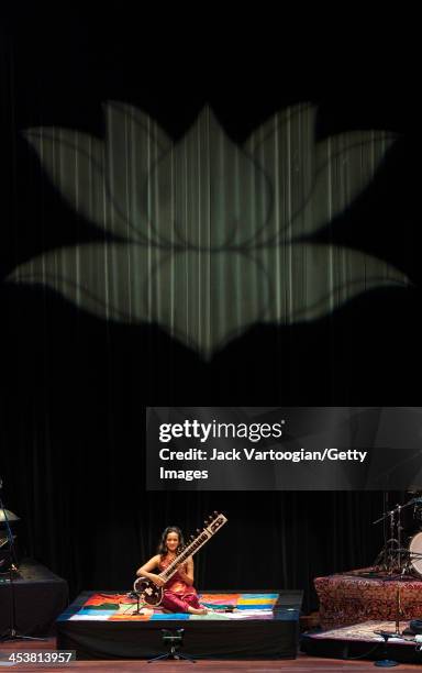 British-born Indian musician Anoushka Shankar plays sitar as she leads her ensemble during a World Music Institute concert at New York University's...