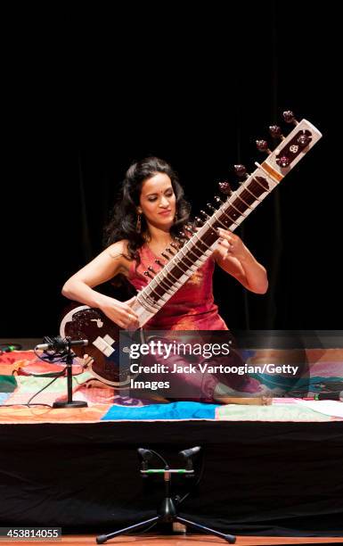 British-born Indian musician Anoushka Shankar plays sitar as she leads her ensemble during a World Music Institute concert at New York University's...